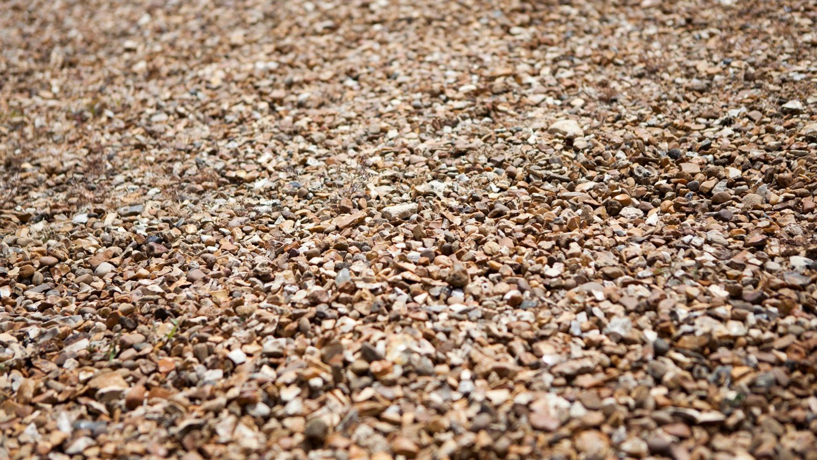 Golden tar & chip driveway texture